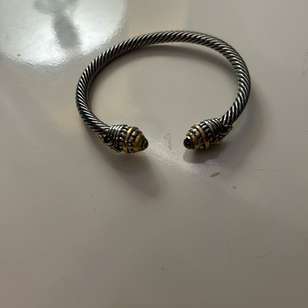 Silver bracelet with green stones